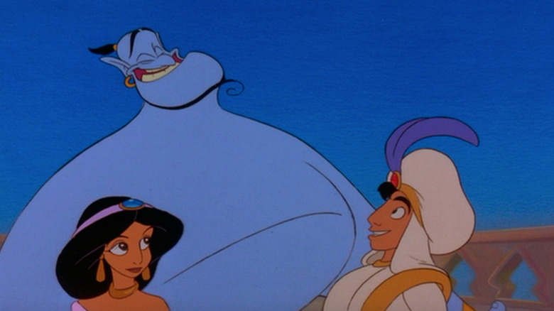 Genie, Jasmine, and Aladdin smiling