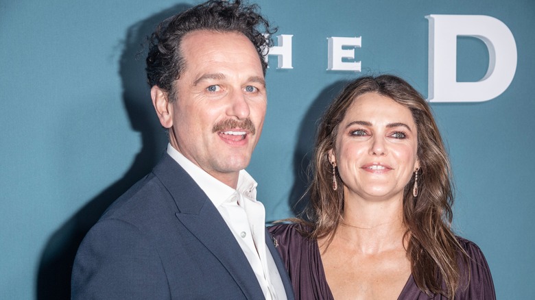 Matthew Rhys and Keri Russell smile