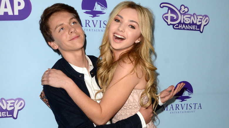 Peyton List hugs Jacob Bertrand