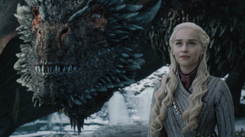 Daenerys standing with dragon