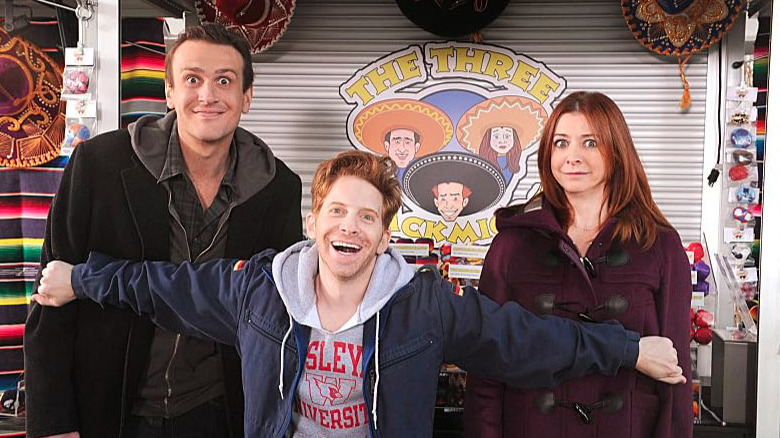 Seth Green with a scared Alyson Hannigan and Jason Segal on How I Met Your Mother