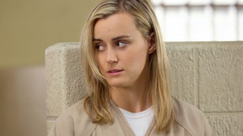 Piper glancing at Alex