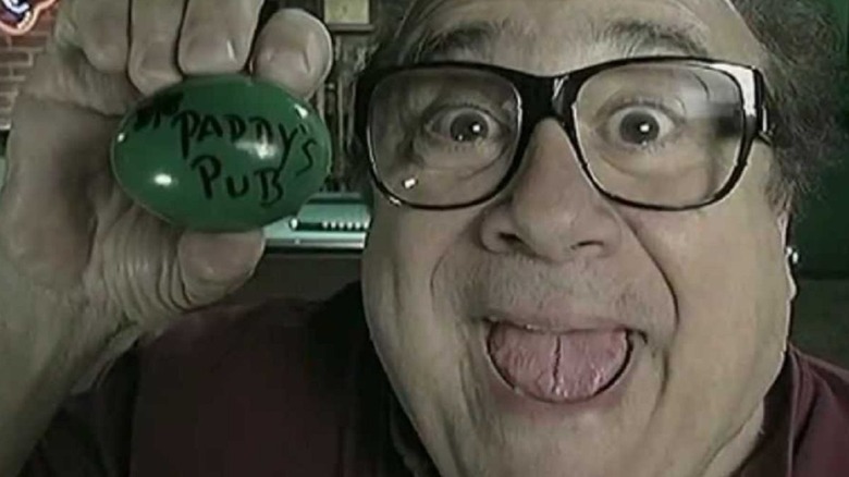 Danny DeVito holding an egg