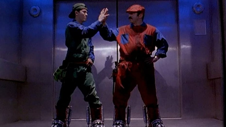 Mario and Luigi high-fiving