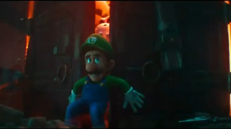 Luigi holding back a door