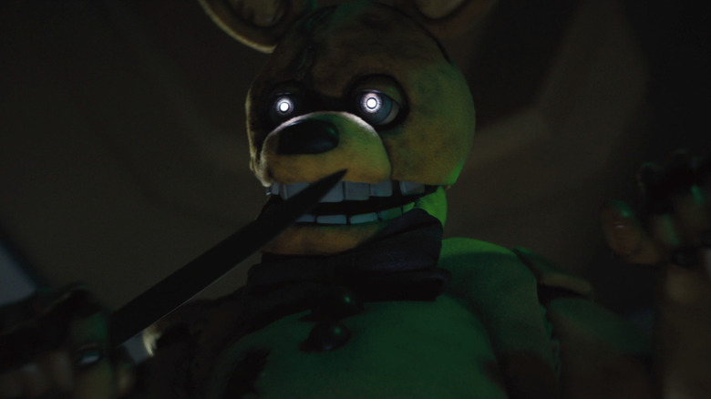 Springtrap holds a knife