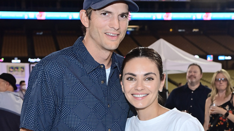 Ashton Kutcher and Mila Kunis posing together