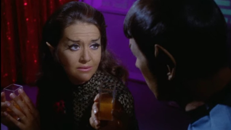 Romulan Commander and Spock drinking