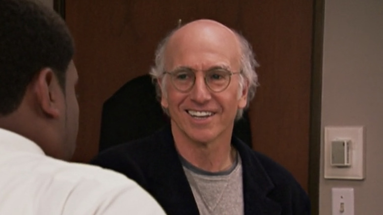 David smiling on an episode of Curb