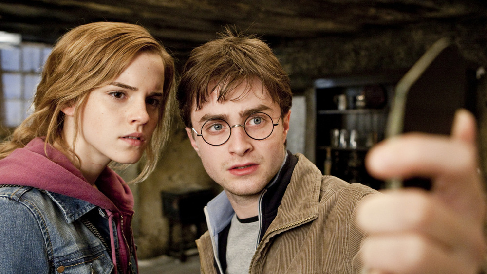 Daniel Radcliffe and Emma Watson as Harry and Hermione