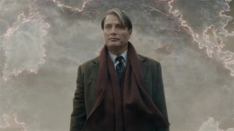 Grindelwald behind a magic shield