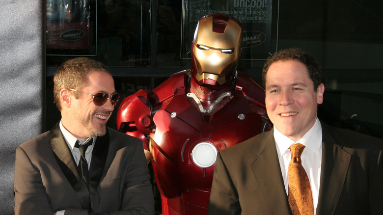 Robert Downey Jr. and Jon Favreau smiling