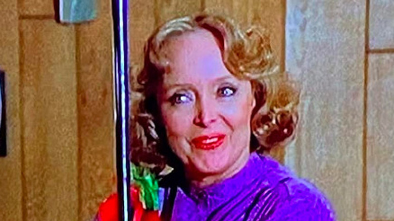 Carolyn Jones reacts with amusement