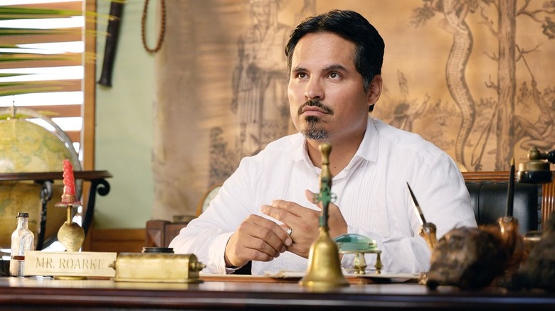 Mr. Roarke at his desk