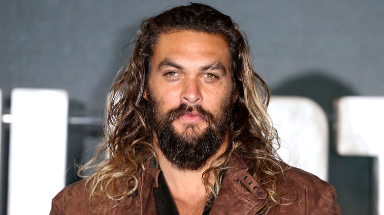 Jason Momoa looking straight into the camera