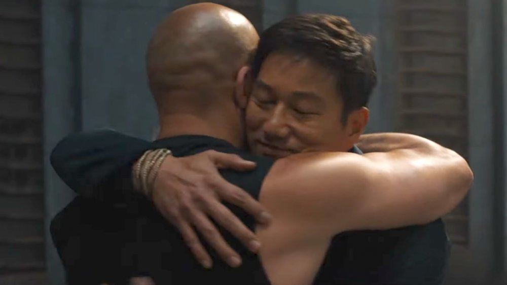 Vin Diesel as Dom Toretto and Sung Kang as Han in Fast & Furious 9