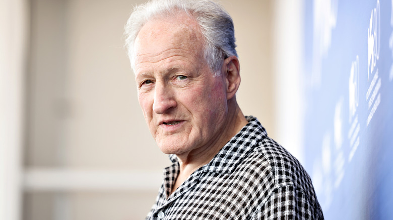 Michael Mann looks to camera