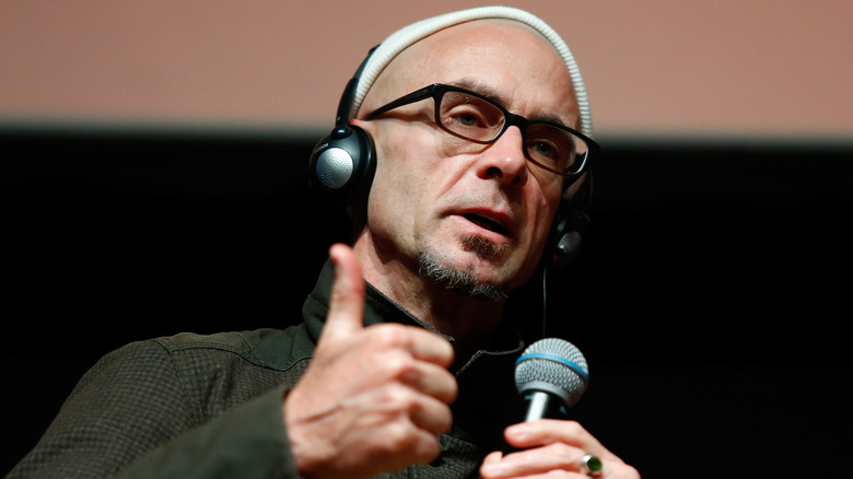 Palahniuk holding microphone and speaking