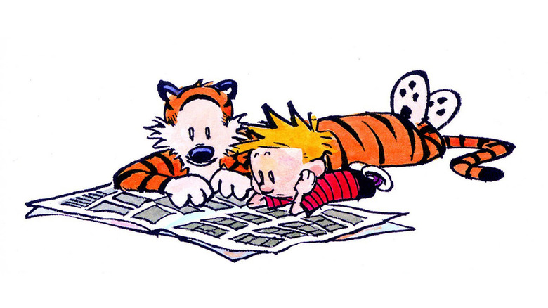 Calvin and Hobbes reading newspaper