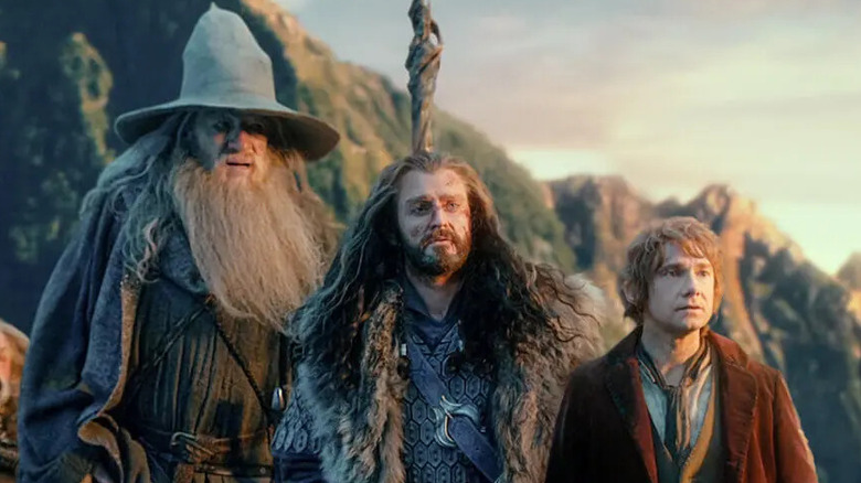 Gandalf stands with Thorin and Bilbo