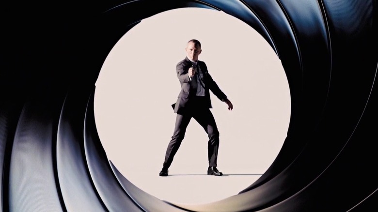 James Bond fires in gun barrel