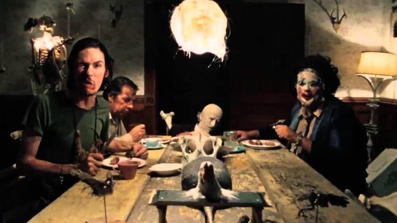 The cannibals sits at a table