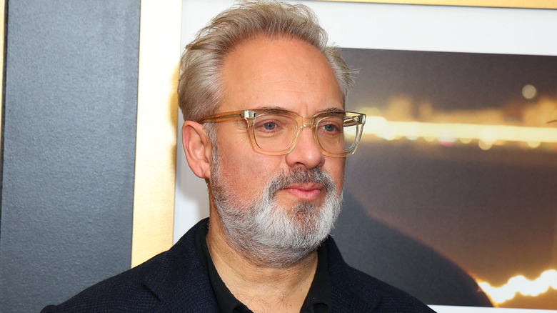 Sam Mendes wearing glasses