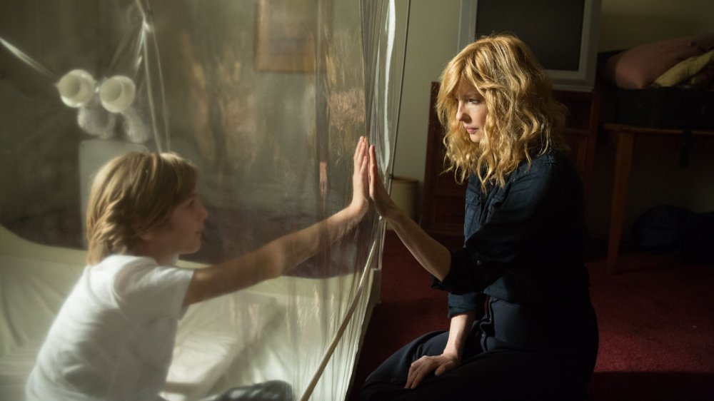 Charlie Shotwell as Eli and Kelly Reilly as Rose in Eli