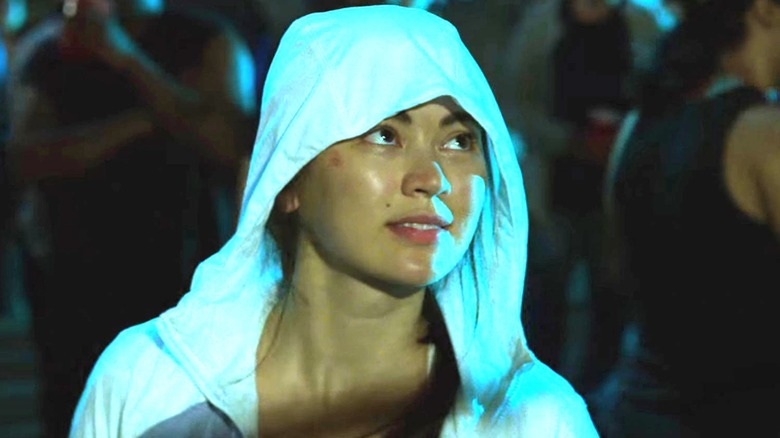 Colleen Wing wearing white hood