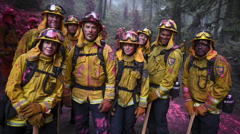 The cast posing covered in pink goop on Fire Country