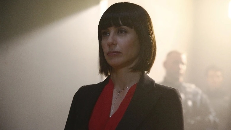 Rosalind Price standing in a dimly-lit room in Marvel's "Agents of S.H.I.E.L.D."