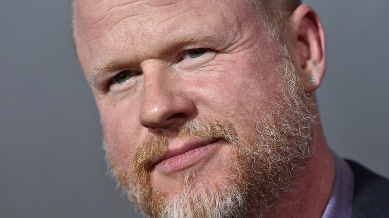 Joss Whedon smiles sadly