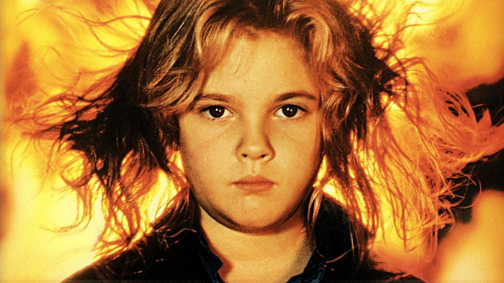 Drew Barrymore on the Firestarter movie poster