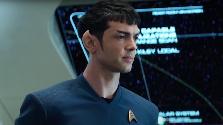 Ethan Peck wearing pointy ears as Spock 