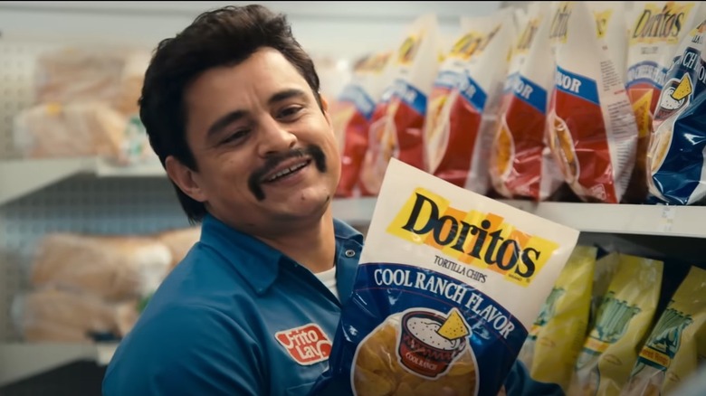 Richard Montañez holding Doritos