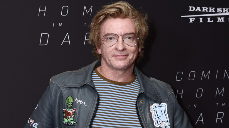 Rhys Darby in leather jacket