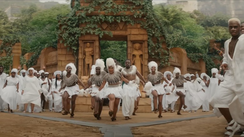 Wakandan dancers in white