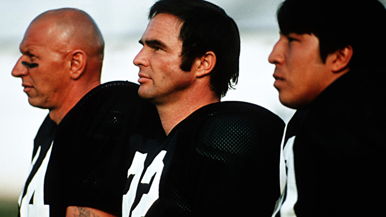 Burt Reynolds scowls in The Longest Yard