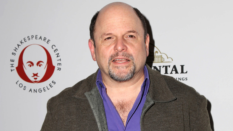 Jason Alexander looking at camera