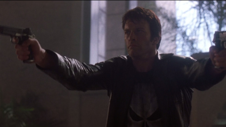 Thomas Jane Frank Castle pointing guns