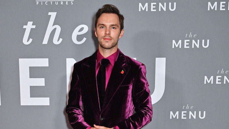 Nicholas Hoult smiling at The Menu premiere