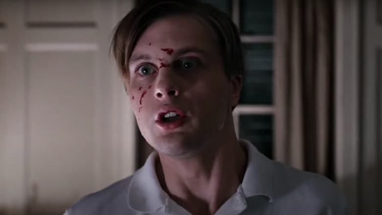 Michael Pitt with blood on face