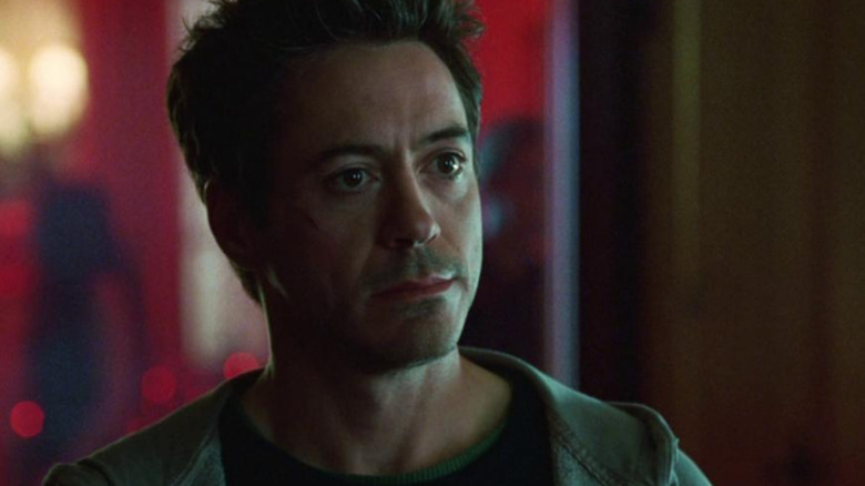 Robert Downey Jr. in dimly lit room