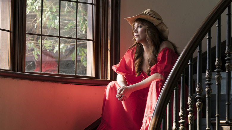 Anna Friel's Nicky Roman stares out of a window