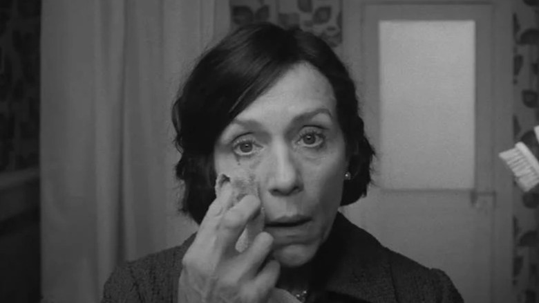 Frances McDormand wiping tears with cloth