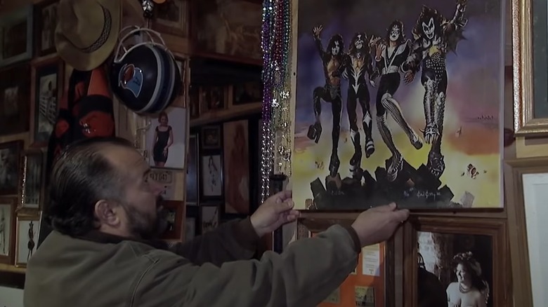 Frank Fritz holding KISS poster