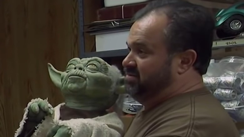 Frank Fritz holding Yoda puppet