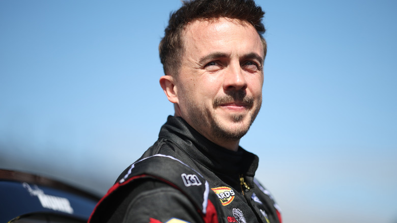 Frankie Muniz squinting on racetrack