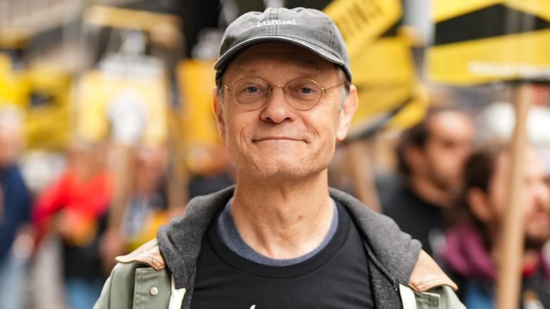 David Hyde Pierce smiling on SAG-AFTRA 2023 strike lines