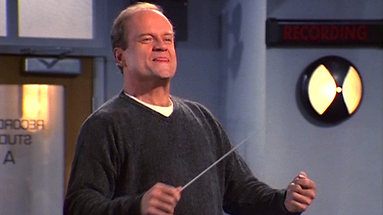 Frasier Crane attempting to conduct an orchestra